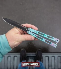 Bear Ops Bear Song IV Cyan Speckle Blue Butterfly Knife - Black -Elite Knives Shop Bear Ops Bear Song IV Butterfly Knife Cyan Speckle Blue Black BHQ 83465 kp in hand web large