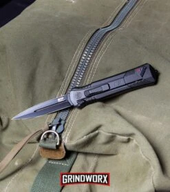 Smith & Wesson Spring Assisted Finger Actuator Spear Point OTF - Black Serr -Elite Knives Shop MP OTF Spring Assisted Spear Point Knife Gray Black BHQ 80731 kp lifestyle web large 1