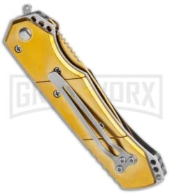 Super Knife Croc Automatic Knife Gold W/ Blue Inlay - Gold Serr 6 Super Knife Croc Automatic Knife Gold W/ Blue Inlay - Gold Serr -Elite Knives Shop Super Knife Croc Auto Stainless Gold Blue Serr GX 35767 jr side large